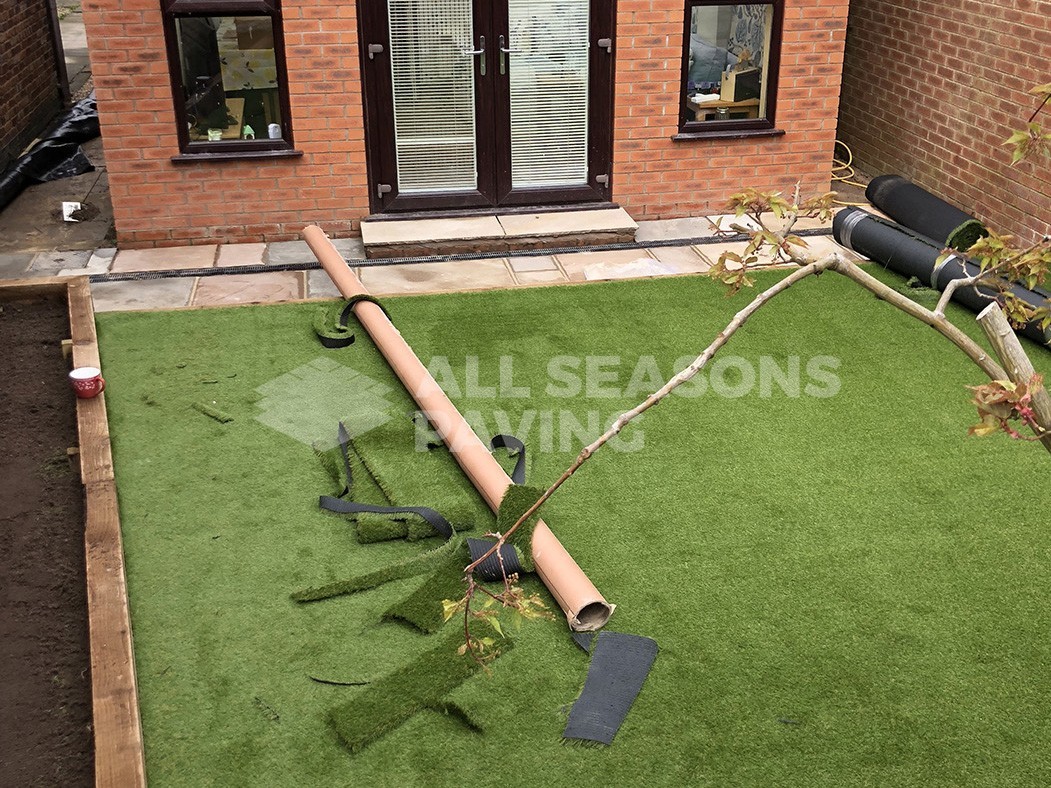 artificial lawn being completed in lancashire