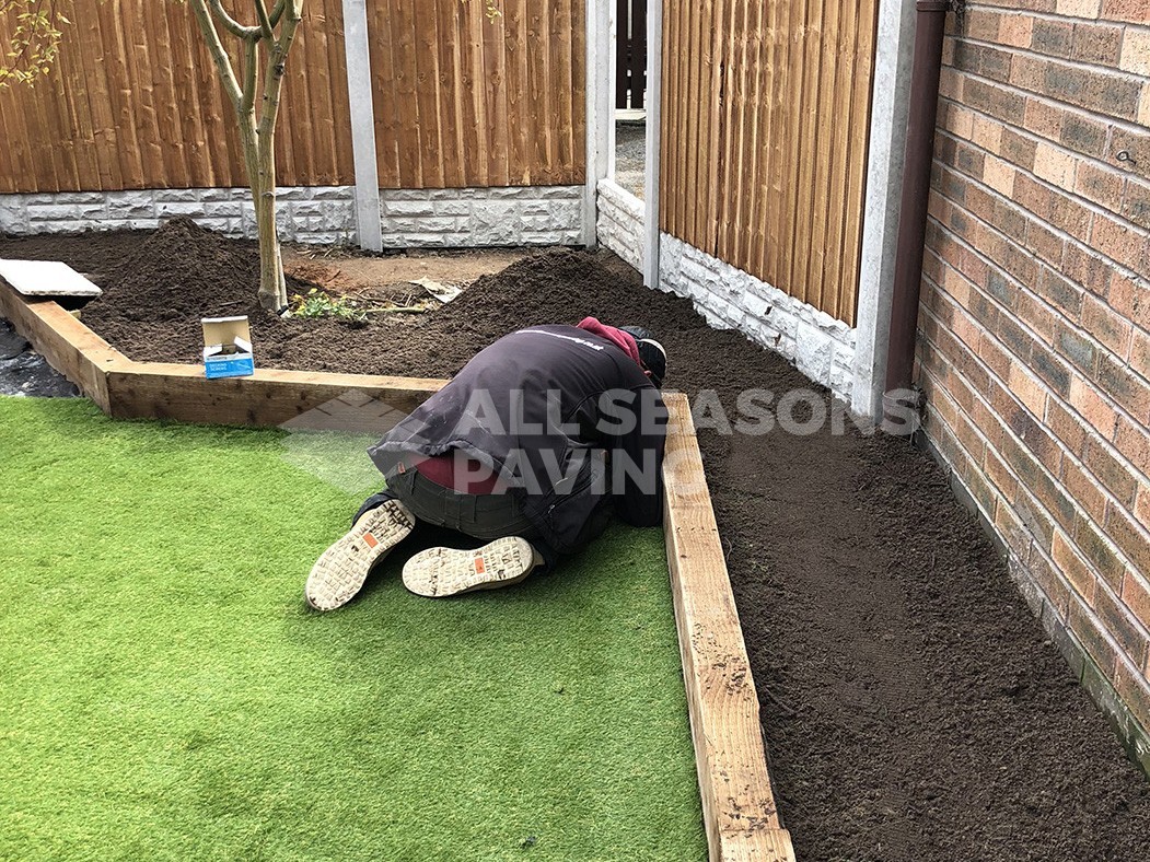contractor completing artificial lawn and landscaping in preston, lancashire