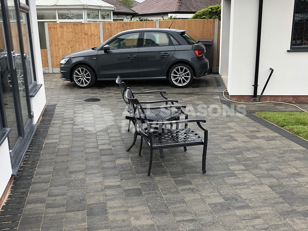 Block Paving Driveway with car and chairs in Preston, Lancashire