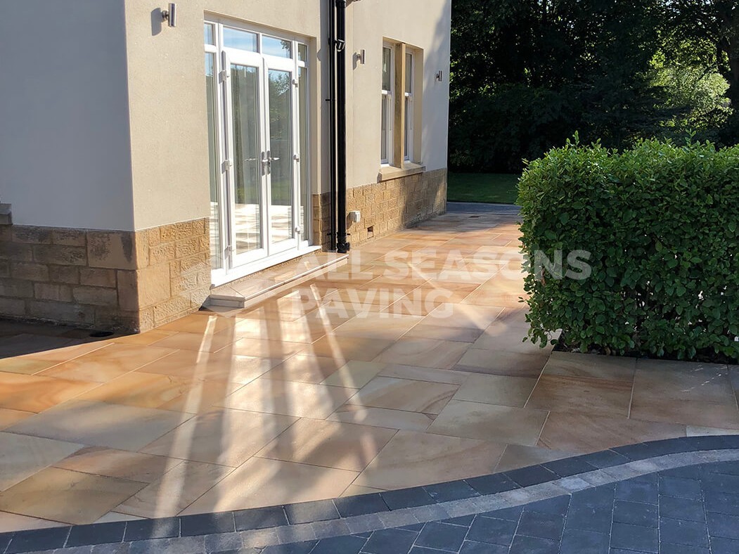 Double door view of Block Paving Indian Sandstone and driveway in Preston, Lancashire