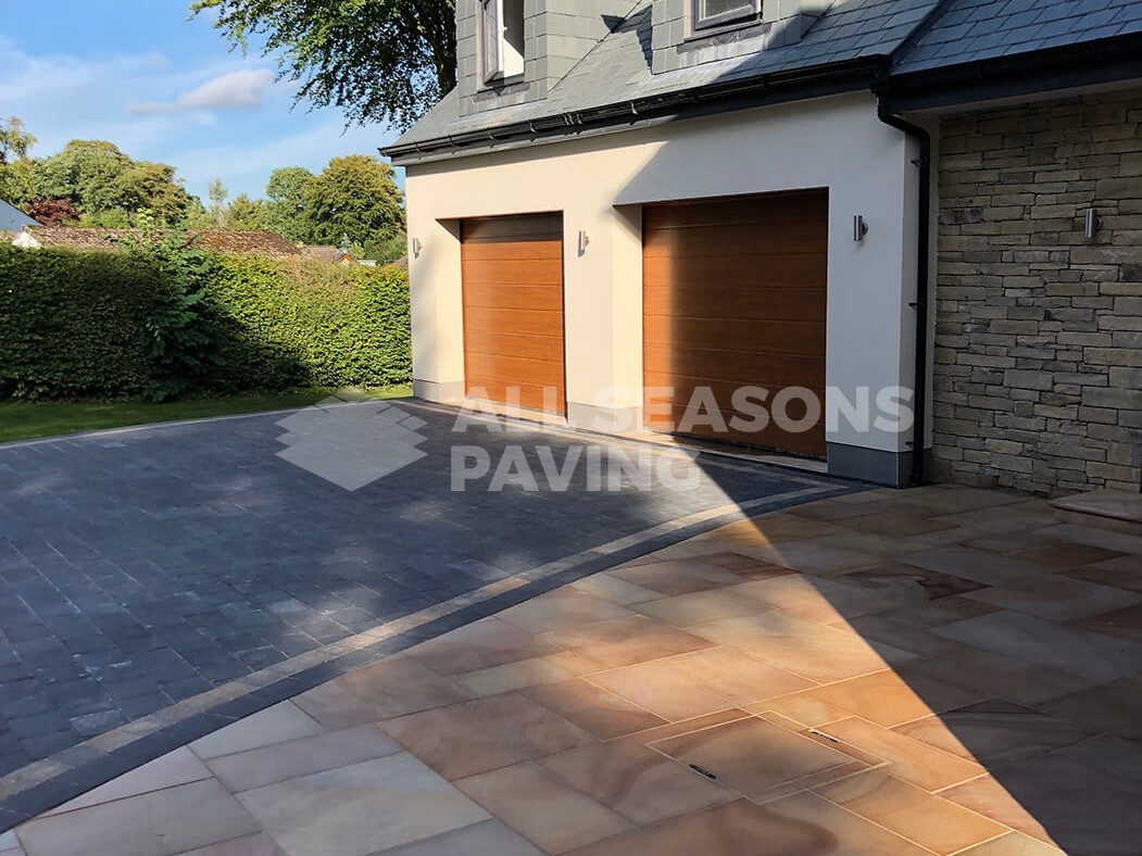 Garage shot of Block Paving Driveway and Indian Sandstone in Preston, Lancashire