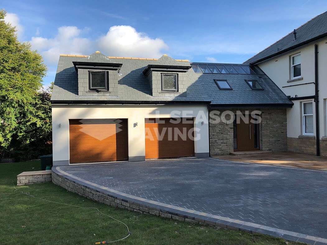Wide shot of garage for Block Paving Indian Sandstone driveway job done in Preston, Lancashire