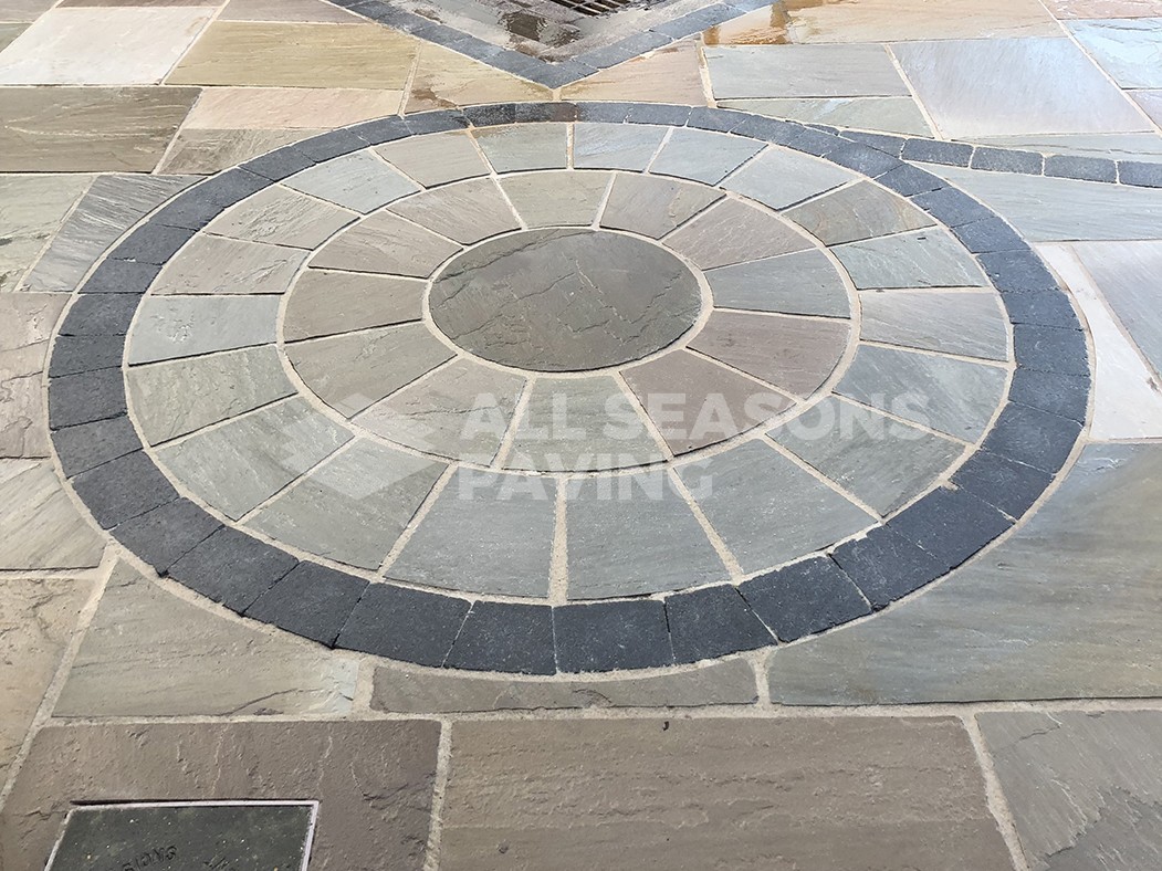 centre circle pattern of framed indian sandstone driveway preston, lancashire