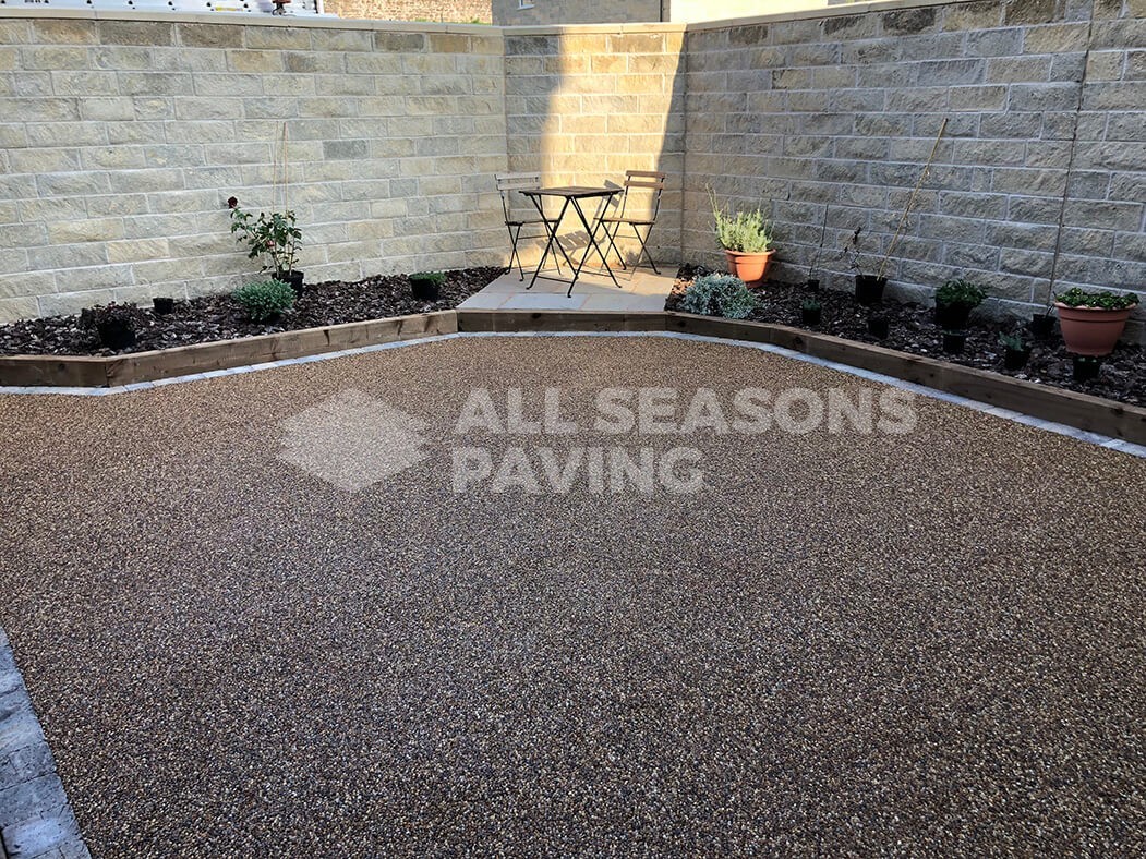 Resin patio area near Preston in Lancashire showing garden furniture.