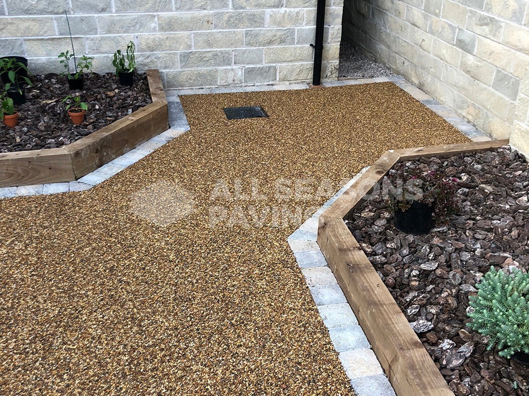 View of resin patio area near Preston in Lancashire showing drain access.