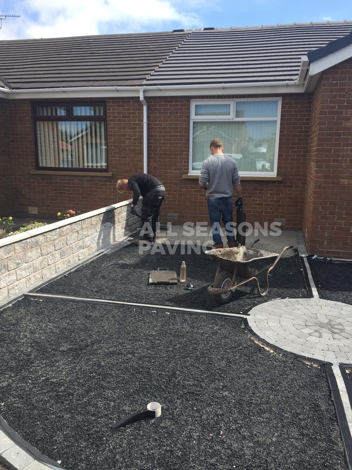 Silver Quartz Resin driveway being completed in Preston, Lancashire