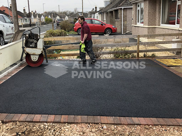 Working on Tarmac Driveway with Indian Sandstone in Preston, Lancashire