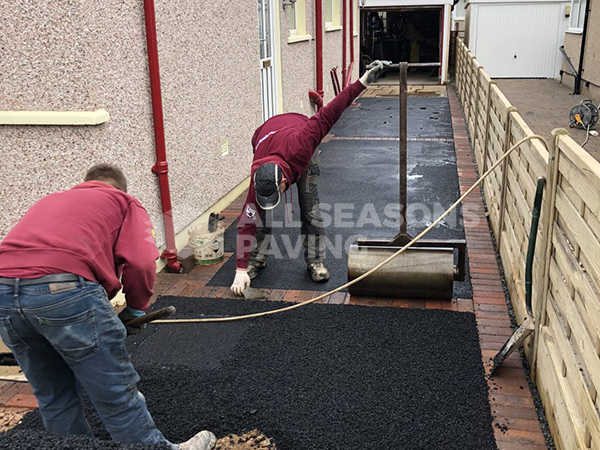Workers on the Tarmac Driveway with Indian Sandstone in Preston, Lancashire