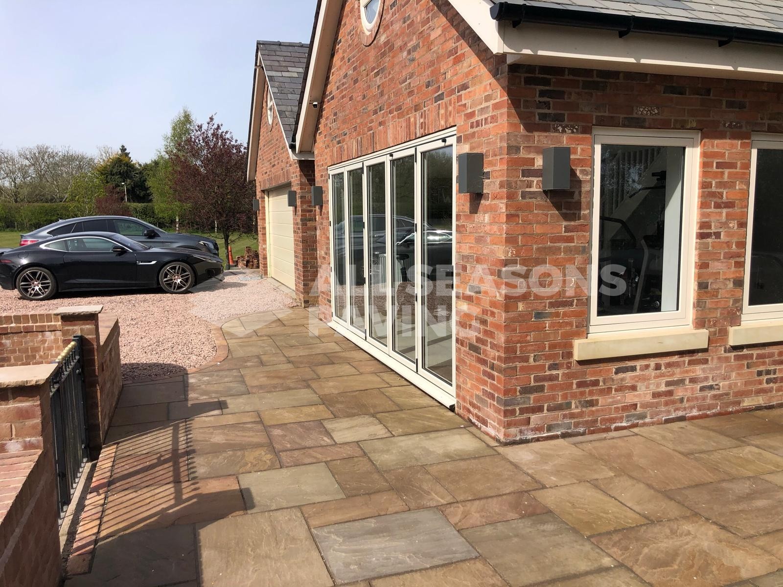 250 sq m of Indian stone 300 linear metres of kerbing and 350 sq m of Decorative aggregate