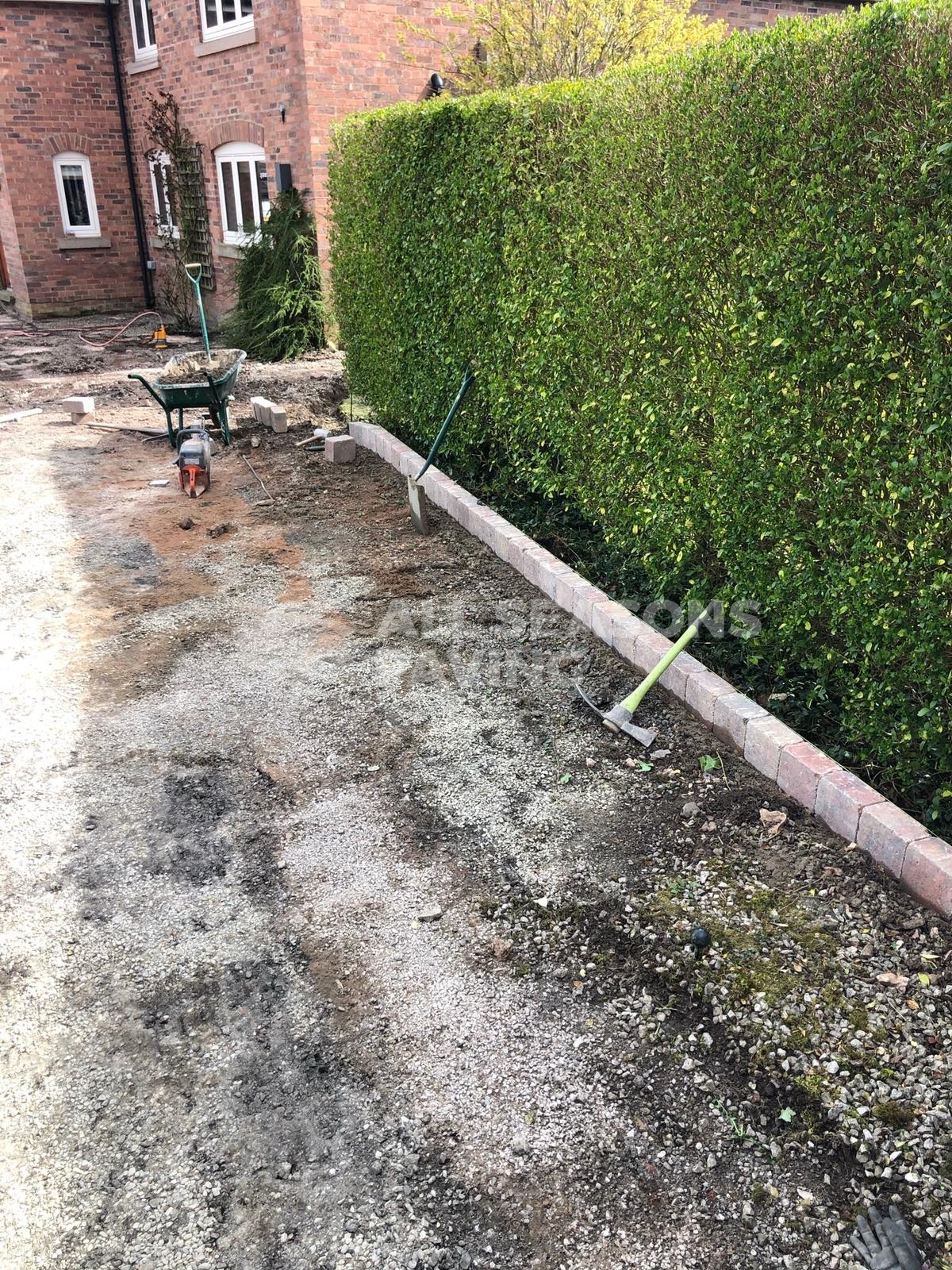 Side view of new driveway being prepared