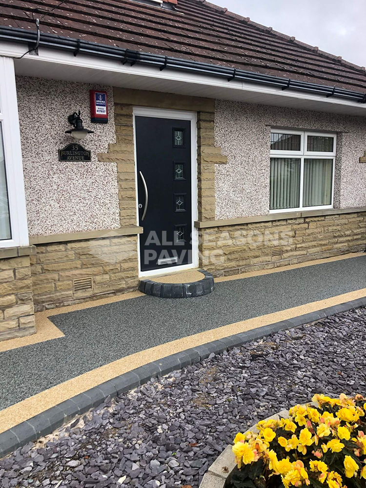 Starlight resin bound driveway installed in Morecambe Amalfi borders and step