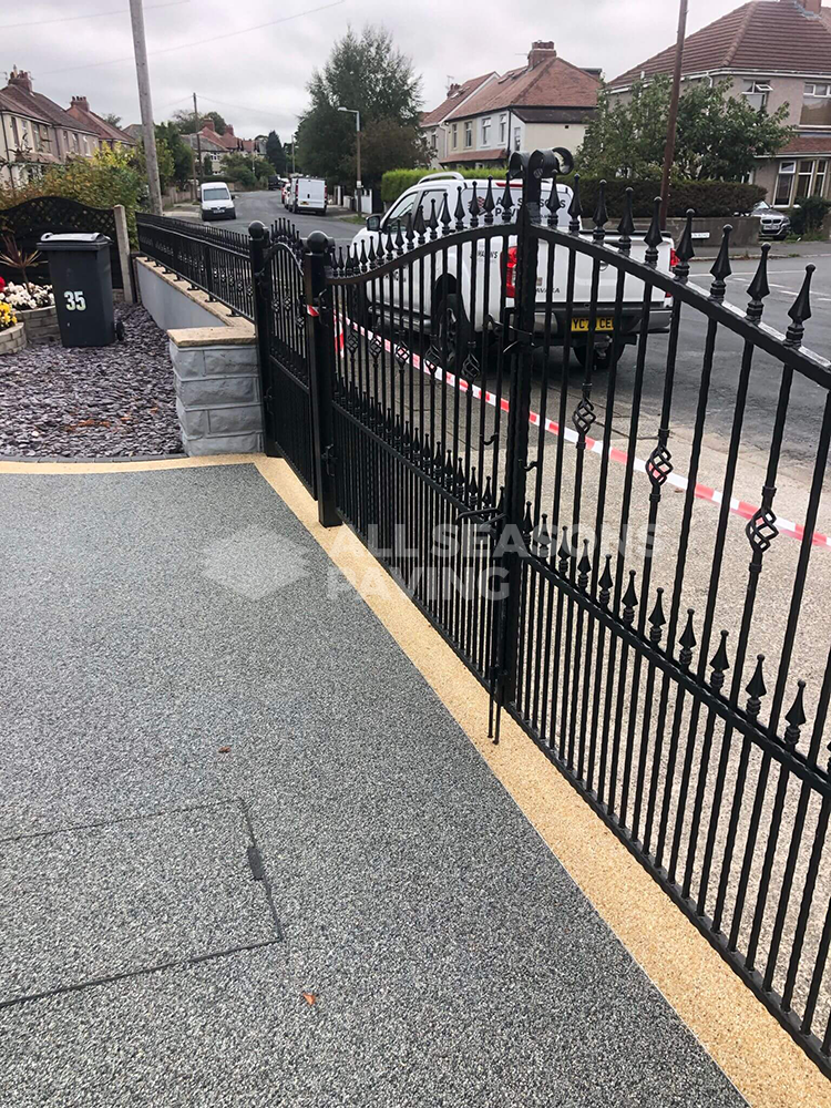 Starlight resin bound driveway installed in Morecambe Lancashire with Amalfi borders step