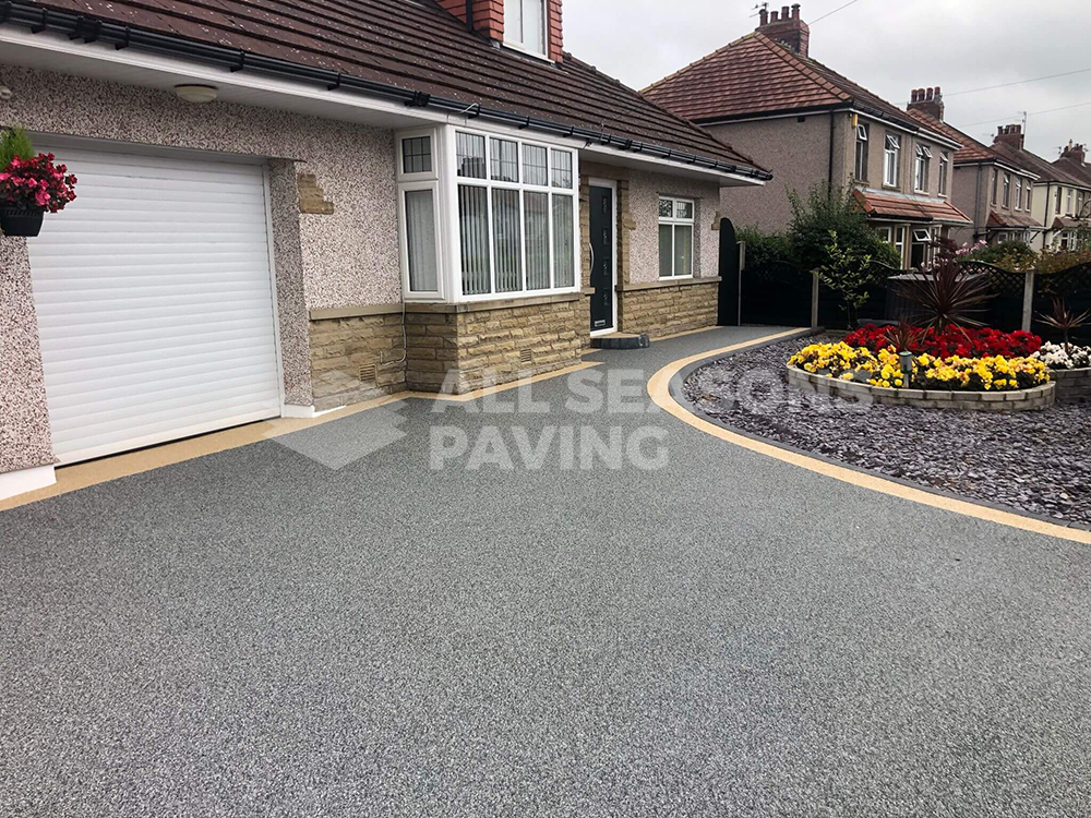 Starlight resin driveway installed in Morecambe Lancashire with Amalfi borders and step