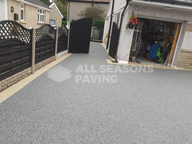 Starlight resin driveway installed in Morecambe with Amalfi borders and step