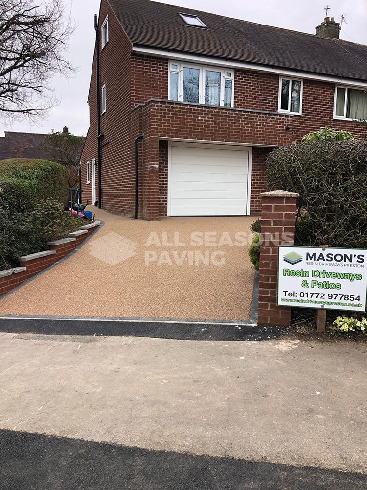 asp sign with rose resin driveway