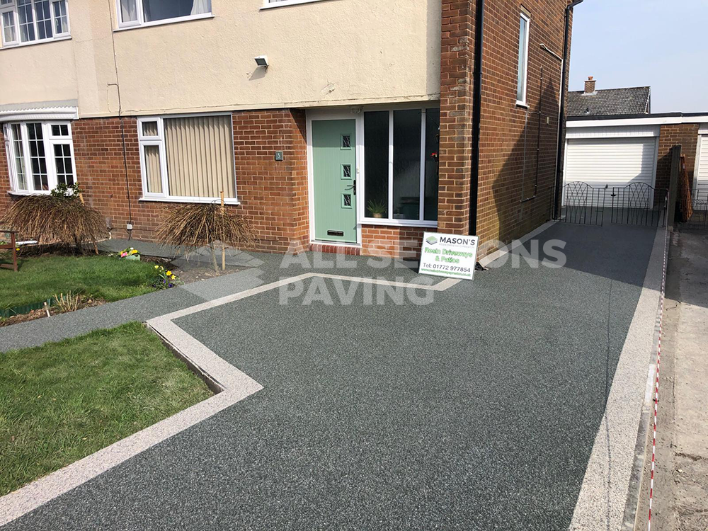 full view of slate grey resin bound driveway